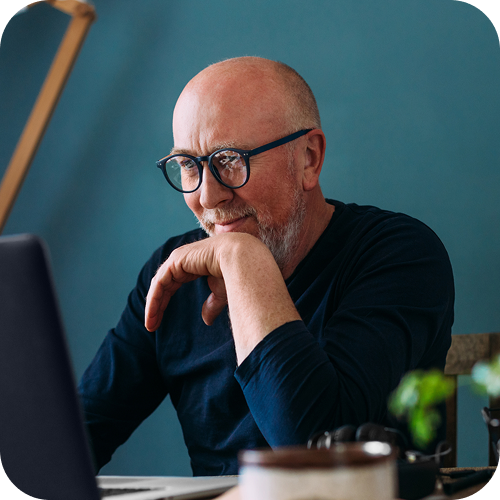 Proffesional Services - Worker at laptop rounded corners